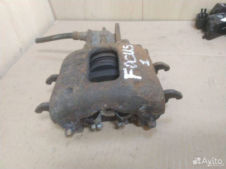 Суппорт тормозной передний правый Ford Focus
