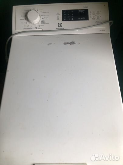 Стиральная машина с вертикальной загрузкой