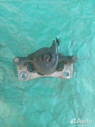 Суппорт передний правый Chevrolet Aveo 2003-2008