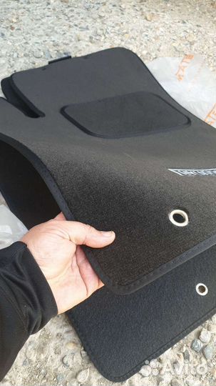 Текстильные коврики по моделям