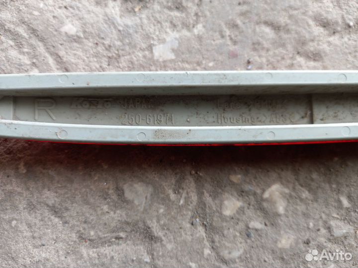 Отражатель задний в бампер левый Mazda 6