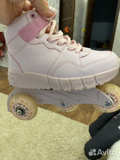 Роликовые коньки