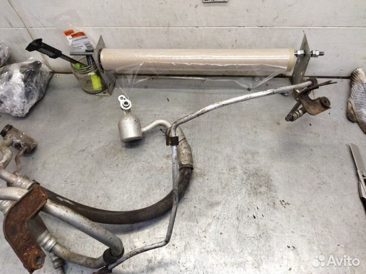 Трубка кондиционера Kia Rio II G4EE 1.4 2008