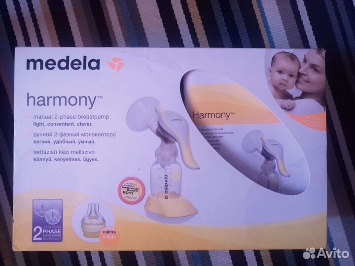 Молокоотсос medela ручной