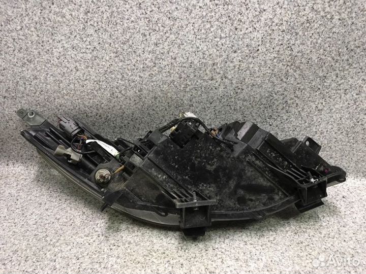 Фара левая Mazda 3 BL 2010