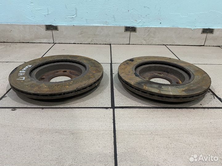 Тормозной диск передний Nissan tiida C11