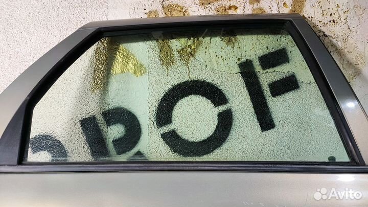 Стекло задней правой двери Лада Калина
