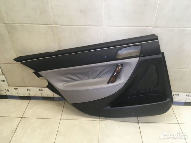 Обшивка двери задней левой 607 2000-2010