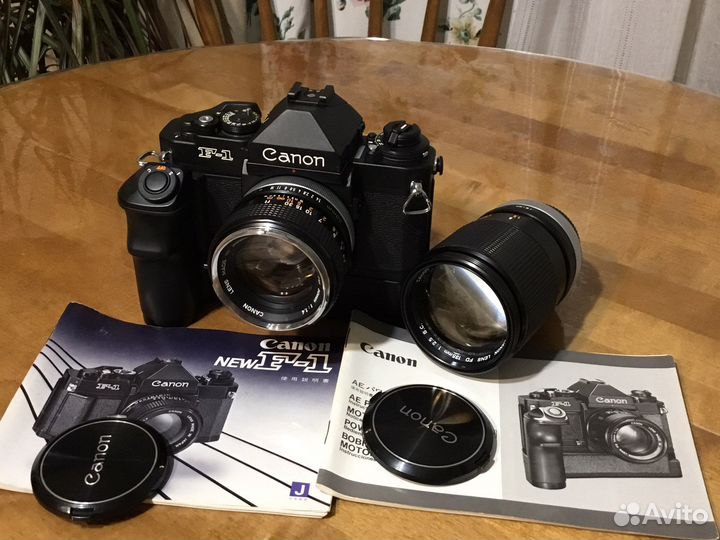 Canon new F-1 + FD 50mm/1,4 + FD 135mm/2,5s.c