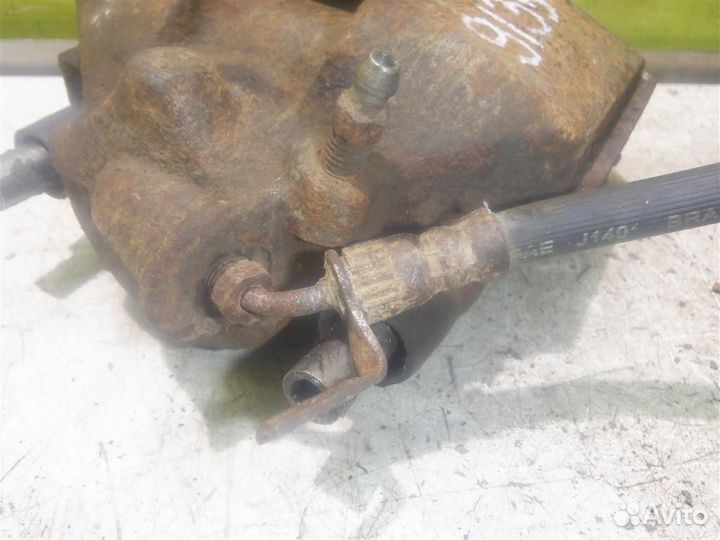 Суппорт передний правый Форд Торнео Коннект