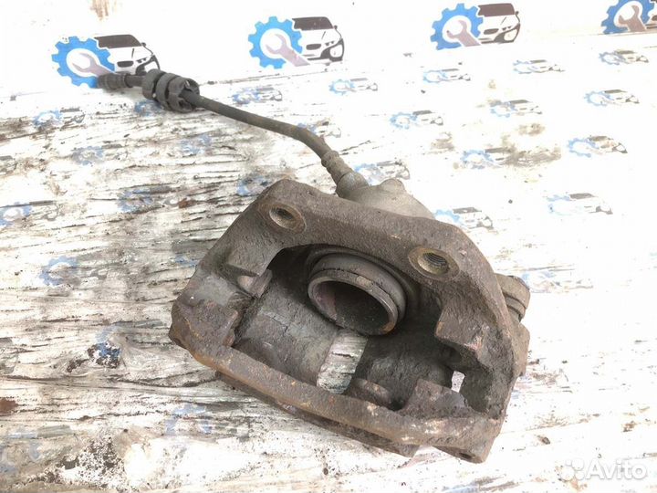 Суппорт передний левый Renault Kangoo D7F 2009