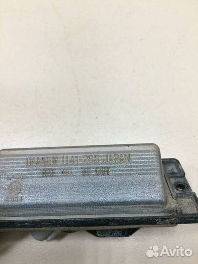 Фонарь подсветки номера Mitsubishi Lancer