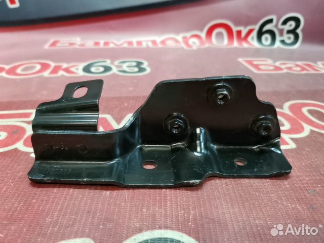 Кронштейн петли капота передний левый Opel Astra