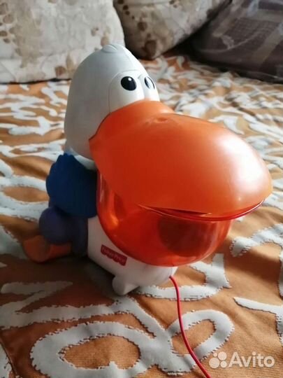 Игрушка забавный пеликан