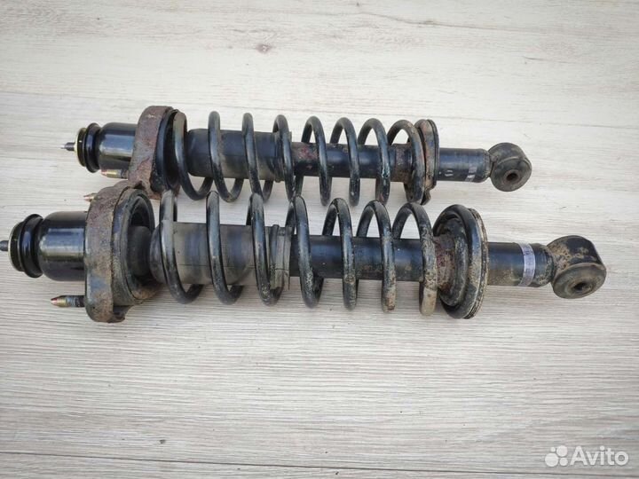 Стойка амортизатора задняя Mitsubishi Lancer IX 9