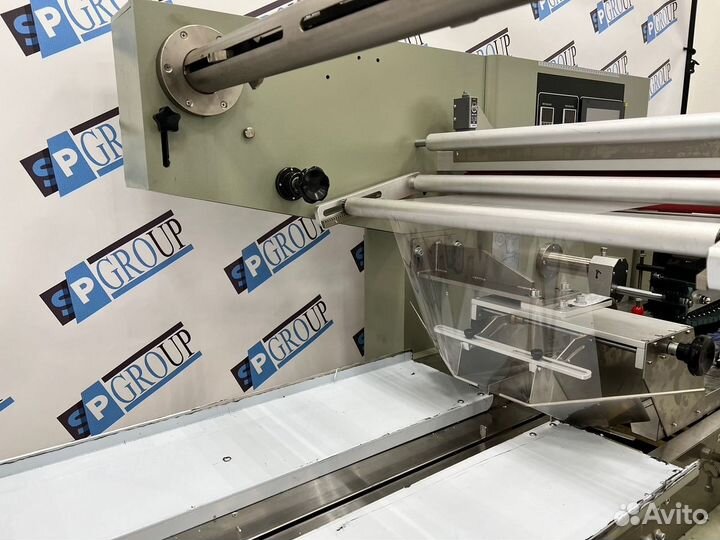 Горизонтальный упаковщик 600(флоупак) с верхней п