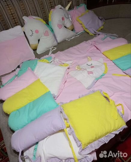 Комплект подушек в кроватку