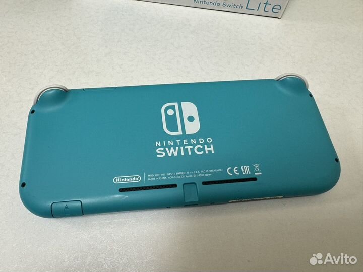 Nintendo Switch Lite 32 gb + 64 gb