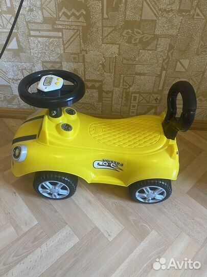 Детская машинка каталка с музыкой