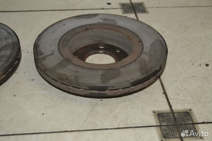 Тормозной диск передний Nissan Almera G15