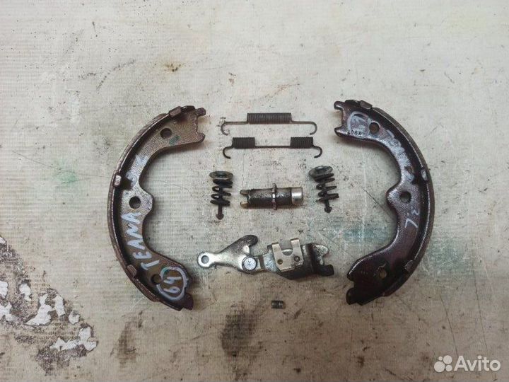 Механизм стояночного тормоза задний левый Nissan