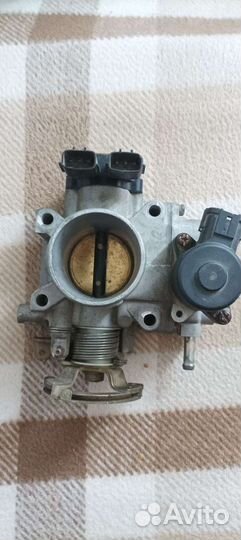 Дроссельная заслонка nissan