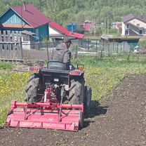 Вспашка земли мини трактором