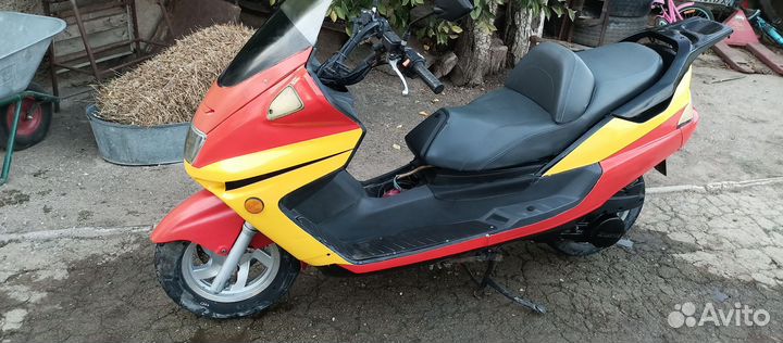 Макси скутер