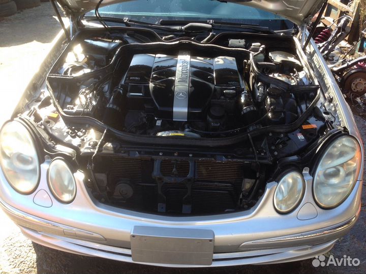 Трос стояночного тормоза Mercedes Benz W211 E