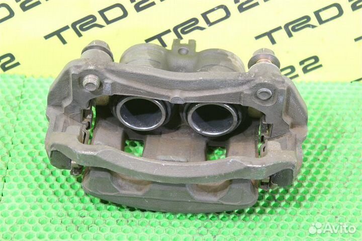 Суппорт тормозной передний левый Nissan Leaf ZE0