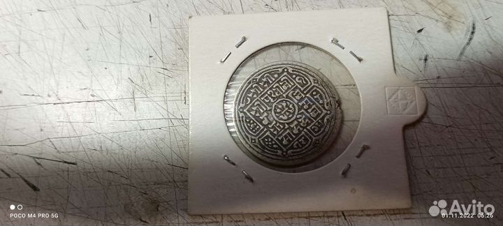 Монета тыбет