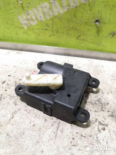 Моторчик заслонки отопителя Ниссан Теана