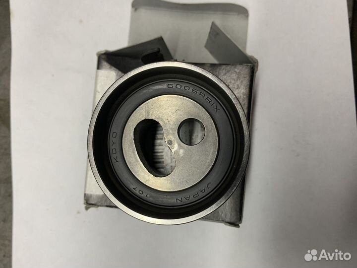 Ролик натяжмтеля грм Мазда, Форд