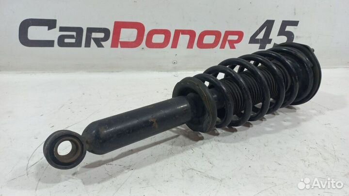 Амортизатор в сборе передний лев./прав. б/у для Ni