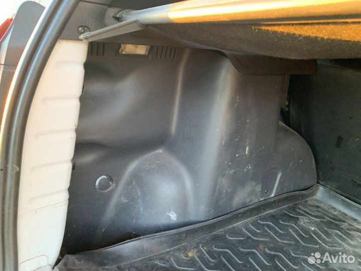 Обшивка багажника левая Renault Duster