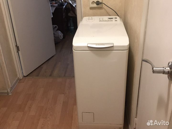 Стиральная машина с вертикальной загрузкой