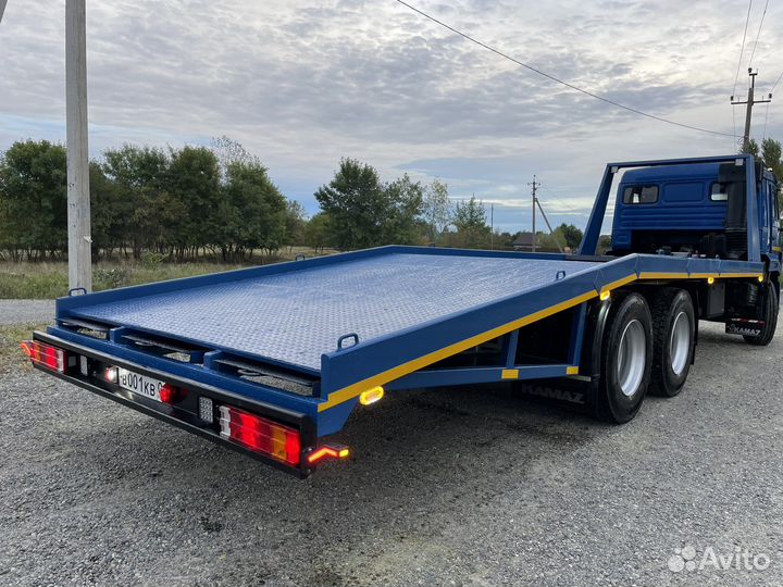 Эвакуаторная платформа ломанного типа сдокументами