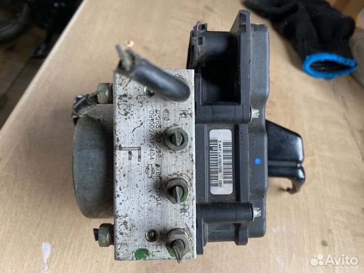 Блок ABS Nissan tiida