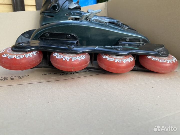 Роликовые коньки