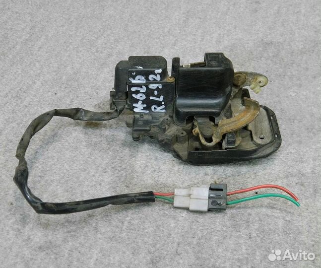 Замок двери задней левой Mazda 626 GE