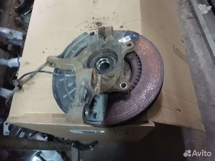 Кулак поворотный левый Kia Optima 4 JF