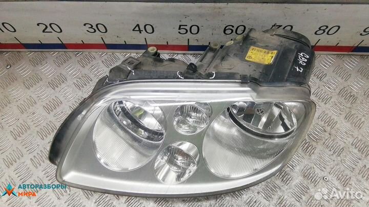 Фара левая Volkswagen Touran 2006