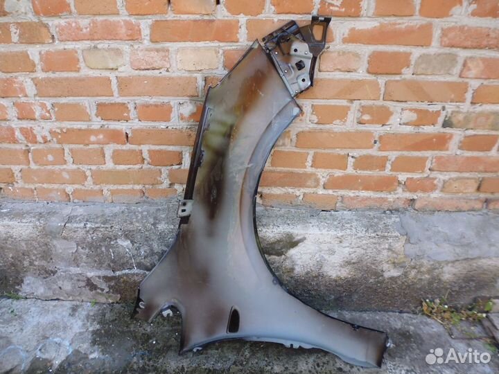 Опель Астра J 5D крыло переднее левое с 2009