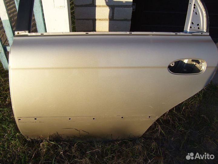 Киа спектра дверь