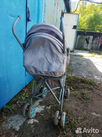 Прогулочная коляска трость