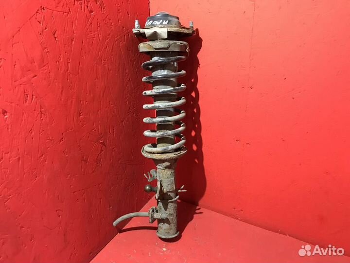 Амортизатор передний правый Киа Рио 1