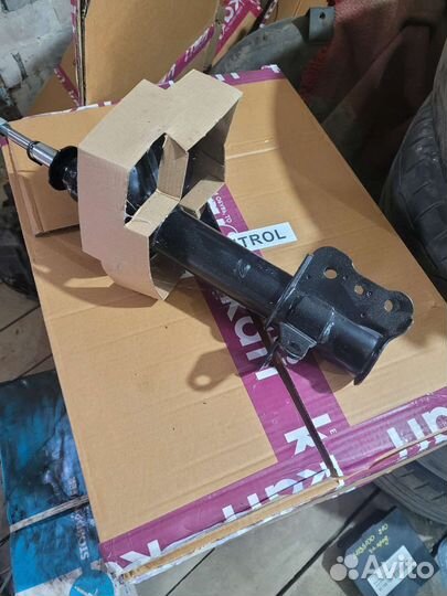 Задний правый амортизатор мазда 323