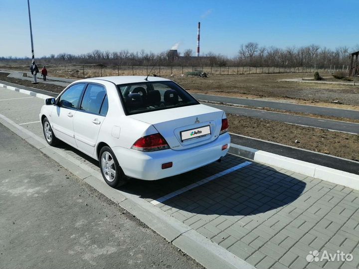 Mitsubishi Lancer 1.6 МТ, 2006, 206 500 км