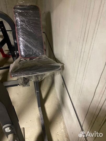 Тренажер сгибание ног сидя - нагружается дисками