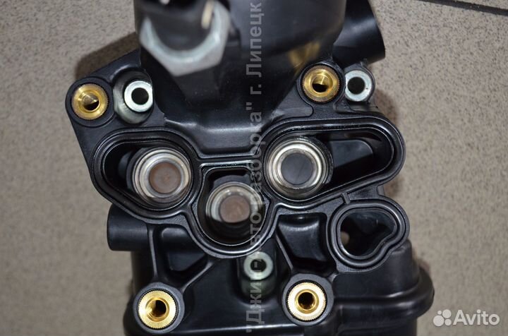 Корпус масляного фильтра 2.0 fsi Golf V Touran